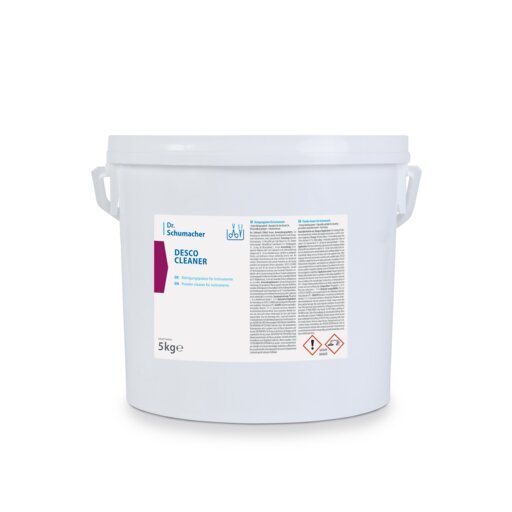En hvid plastbeholder med to håndtag, mærket "Dr. Schumacher DESCO CLEANER" fra Dr. Schumacher GmbH, er en overfladerens, der på frontetiketten indeholder instruktioner, advarsler og faresymboler og lover stribefrie resultater.