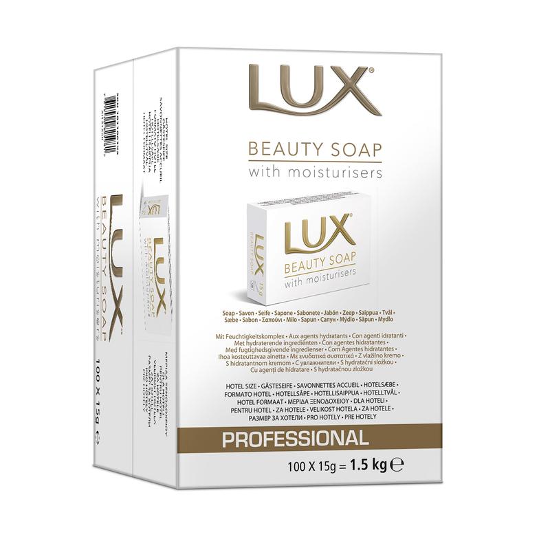 En pakke med 100 stykker LUX Professional Beauty Soap gæstesæbe (hver 15 g, i alt 1,5 kg) fra Diversey Deutschland GmbH & Co. OHG, med påskriften "Professional" til hotel- og gæstebrug, med produktinformation og billede på den hvide æske.