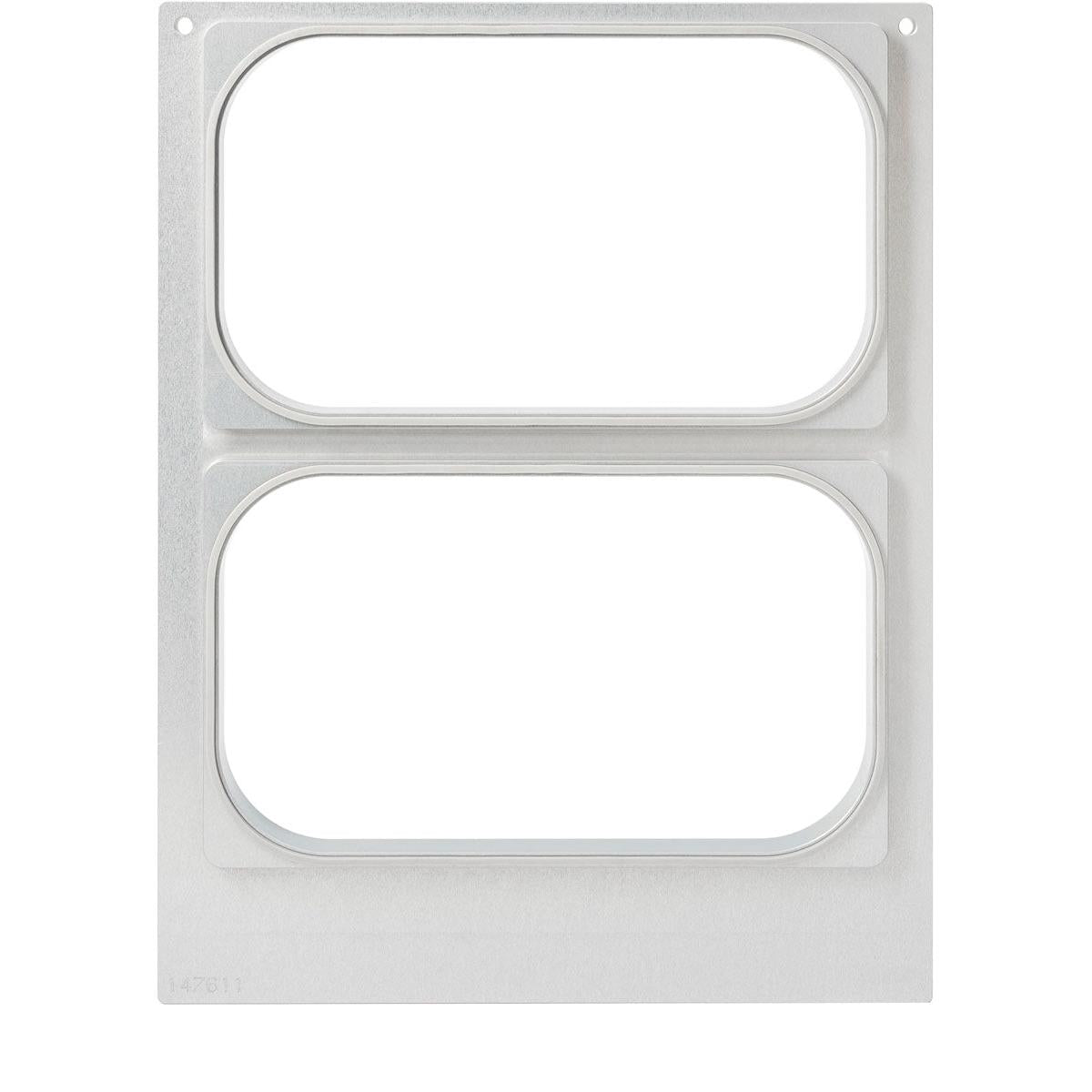 Duni GmbH-kassetten DF15/25 til PP 1/4 GN skåle (265x161 mm, 2-brug) er en metalplade med to centrale, afrundede rektangulære udskæringer og små hjørnehuller til fastgørelse - ideel til opbevaring af mad i gastronomien. Pakke: 1 stykke.