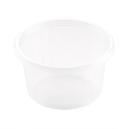 Afbildet er en klar, tom Fixpack® rund Transparent PP-beholder fra Duni GmbH i rund form, set fra en let forhøjet vinkel foran en hvid baggrund.