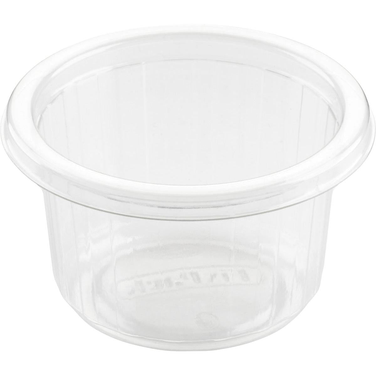 Duni GmbH Dressingbæger Fixpack Transparent APET 80x80x46 mm (pakke med 50 stk) er en lille, rillet, bredkantet beholder, ideel til saucer eller krydderier, vist tom på hvid baggrund.
