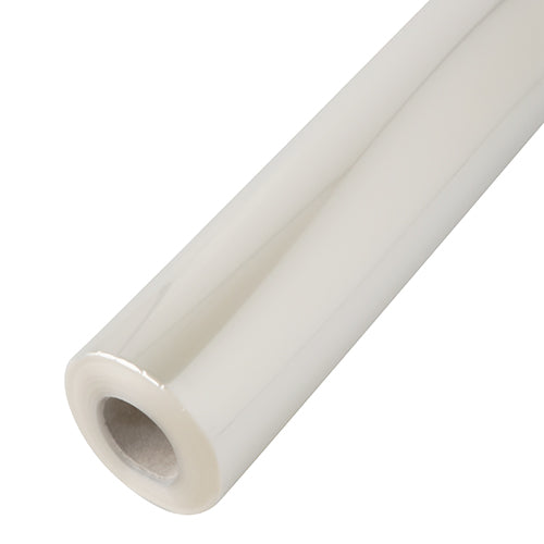 En nærbillede af den utrykte Starpak Transparentfolie fra Starpak med papkerne og transparent overflade vises skråt foran en hvid baggrund for at fremhæve dens alsidige anvendelsesmuligheder.