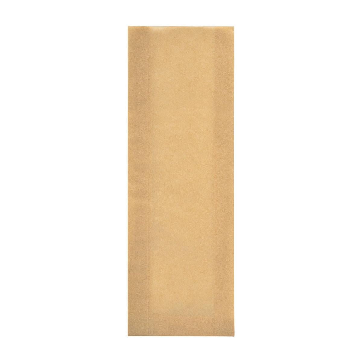En rektangulær, brun Ovenbag tall papir (105x40x320) fra Duni GmbH er afbildet ubrugt på en hvid baggrund. Posens overflade er glat og uden håndtag eller branding. Solgt i pakker med 600 stykker.