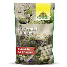 En 750g pose Neudorff Shop Azet LavendelGødning, med lavendel og blå-lilla blomster på emballagen. Denne organiske gødning nærer op til 60 planter og fremmer en robust, tørketolerant halvbuskvækst.