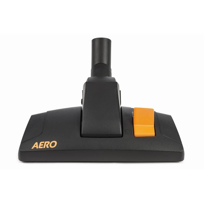 En sort TASKI AERO kombi-rulledyse 32mm gulvdyse fra Diversey Deutschland GmbH & Co. OHG, med gul "TASKI AERO" på venstre side og en stor orange knap på højre side, vist på hvid baggrund.