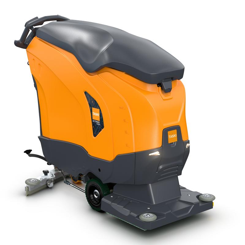 TASKI ULTIMAXX 2900 OB50 Performance BMS 25A EBU fra Diversey Deutschland har en hjuldrift af næste generation, en 63-liters tank, synlig skrubbteknologi foran, et ergonomisk greb bagpå og et lysende orange/mørkegråt design.