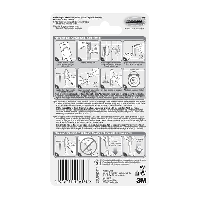 På bagsiden af Command™ Badeværelsesmetalkrog "Modern Reflection" (3M Deutschland GmbH) emballagen finder du en billedlig vejledning til montering/fjernelse af klæbestrimlerne, anvendelsestips, flersprogede produktinformationer, stregkode og producentoplysninger nederst.