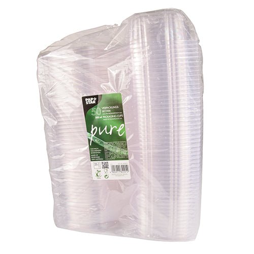 En gennemsigtig, plastikindpakket emballage indeholder 50 PAPSTAR delikatesse- og salatskåle af krystalklar PLA "pure" med klaplåg fra PAPSTAR GmbH, forsynet med en grøn-hvid etiket på forsiden med produktinformationer.