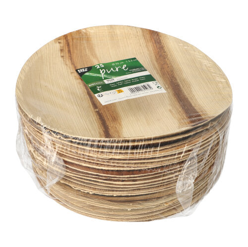 En stak PAPSTAR 25 tallerkener, palmeblad "pure" rund fra PAPSTAR GmbH, runde biologisk nedbrydelige tallerkener af gennemsigtig plast med grøn-hvid etiket med mærke og mængde - perfekt som miljøvenligt engangsservice til enhver begivenhed.