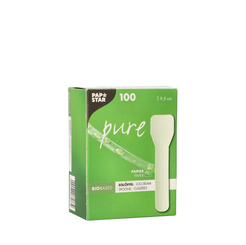 En hvid æske med påskriften "PAPSTAR ispind papir pure" fra PAPSTAR GmbH indeholder 100 miljøvenlige 9,5 cm store ispinde af papir, hvis emballage fremhæver den biologiske nedbrydelighed og viser et billede af en hvid ske.