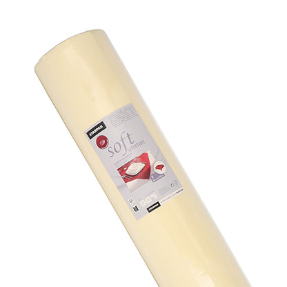 Starpak-dugen "Soft Selection" er en cremet, stoflignende fleece-dug (40 m x 1,18 m), der er rullet med en etiket med sengetøjsmotiver på hvid baggrund.