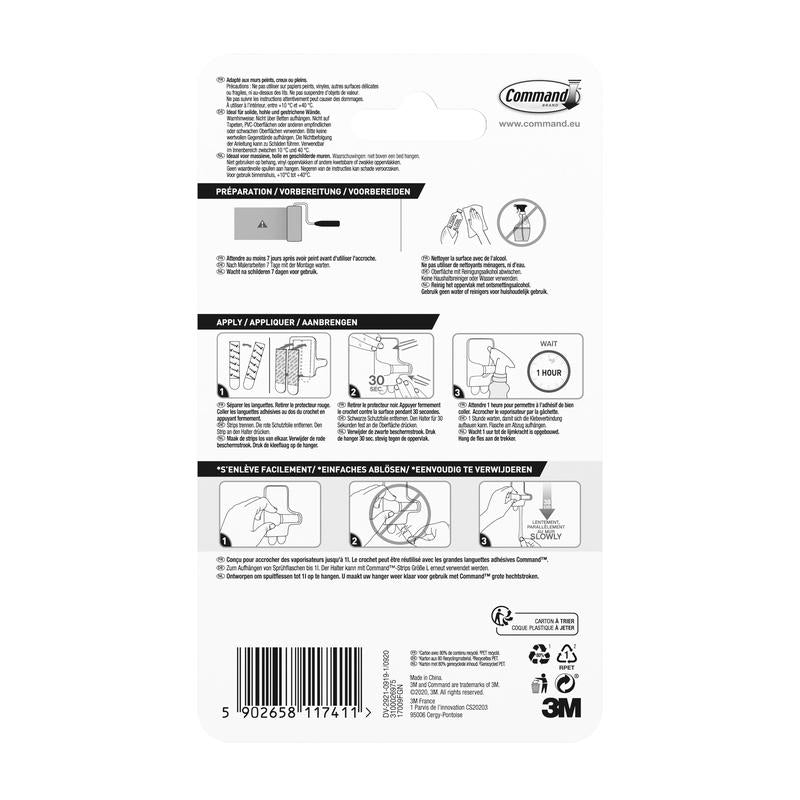 På bagsiden af emballagen til Command™ sprayflaskeholder 17009 fra 3M Deutschland GmbH finder du en illustreret trin-for-trin vejledning til brug og fjernelse, flersproget tekst og en stregkode nederst.