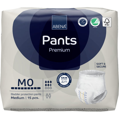 En 15-pak ABENA Pants Premium M fra Abena Re-Seller GmbH kendetegnes ved høj sugeevne, "soft & secure" og "skin-friendly" egenskaber, med produkt- og bæredygtighedssymboler på emballagen.