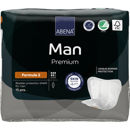 Eine Packung mit 15 ABENA Man Formula Premium Blasenschutzschilden der Abena Re-Seller GmbH ist mit Produktinfos, Zertifizierungslogos und einem Bild des Schildes auf der Verpackung versehen.
