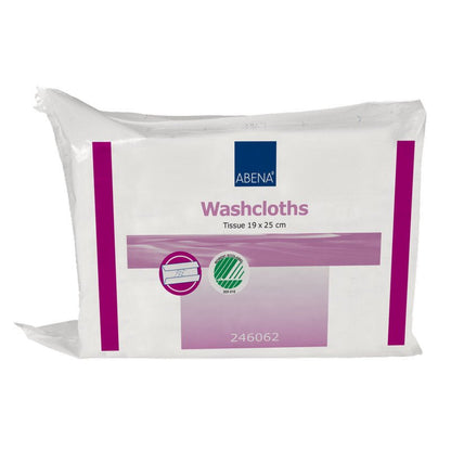 En gennemsigtig plastemballage med teksten "Abena Re-Seller GmbH Engangsvaskehandsker, papir 6-lags, 19x25 cm, hvid" indeholder 125 vaskehandsker. På forsiden er der lilla og grønne markeringer og nummeret 246062; vaskehandskerne er synlige indeni.