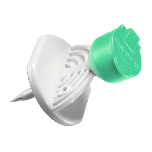 En B.Braun Mini-Spike®-tegnestift fra B. Braun Deutschland GmbH & Co. KG i grøn-hvidt plastdesign med en flad, rund overside og en spids ende; undersiden er udformet således, at den forhindrer, at den trænger dybt ind i overflader.