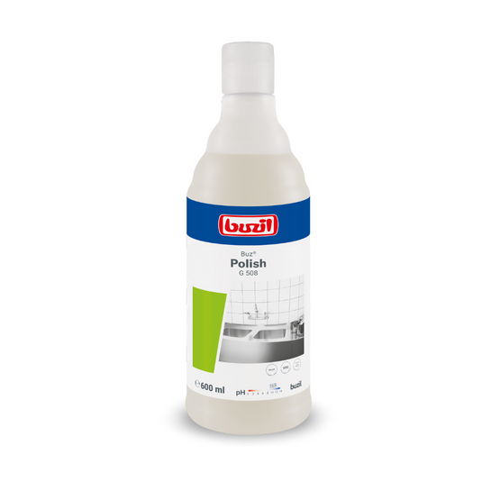 En 600 ml flaske Buzil Buz® Polish G 508 Brugsklar skurecreme, stående oprejst. Etiketten viser et blå-hvidt design med grønne accenter og billedet af en flisebelagt overflade, der fremhæver effektiviteten ved overfladerengøring. BUZIL-WERK Wagner GmbH & Co. KG's logo er fremtrædende placeret øverst.