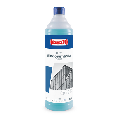 En flaske Buzil Buz® Windowmaster G 525 glas- og vinduesrens-koncentrat fra BUZIL-WERK Wagner GmbH & Co. KG med blå hætte og etiket med billede af en bygning med glasvinduer. Flasken lover stribefri rengøring og er markeret med et 1-liters volumen og pH-informationer for optimal ydeevne.