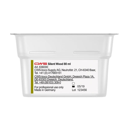 Nahaufnahme eines CWS ParadiseLine Waschraumduft für Duftspender Paradise Air Bar-Behälters mit Herstellerangaben, Kontaktinformationen, Chargennummer und Verfallsdatum auf dem Etikett. Nur für den professionellen Gebrauch.