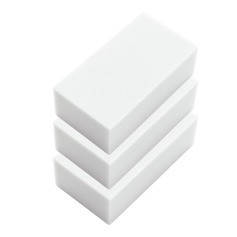 Tre hvide SMUDSGUMMI-svampe (140x54x29 mm, melaminharpiks) fra Haug Bürsten KG er stablet foran en enkel hvid baggrund.