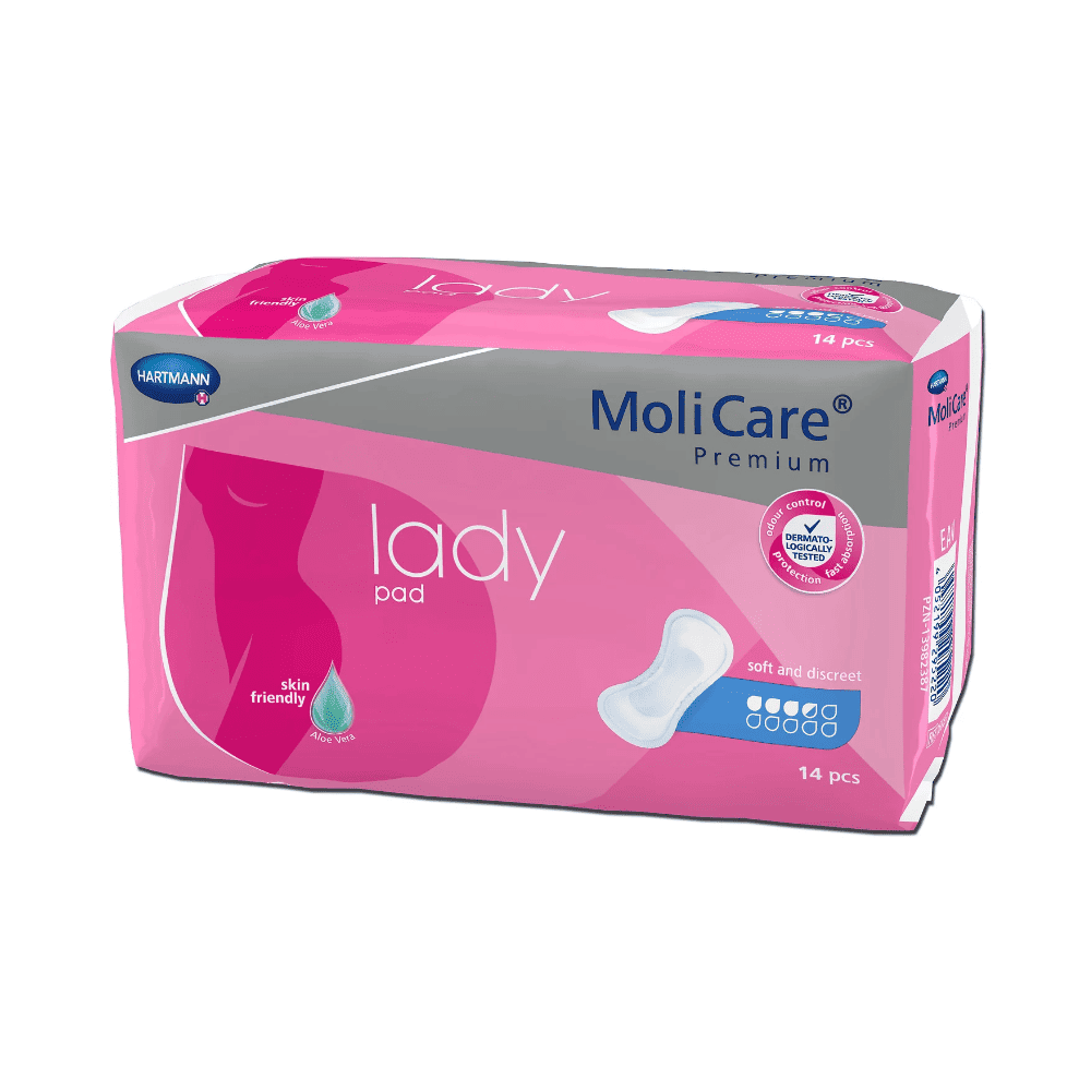 En pakke Hartmann MoliCare® Premium Lady Pad indlæg er udstillet. Emballagen er lyserød med lilla og hvidt design og viser produktnavnet og mærkelogoet. Pakken indeholder 14 pads, ideel til let blæresvaghed, og fremhæver, at produktet er hudvenligt, blødt og diskret.