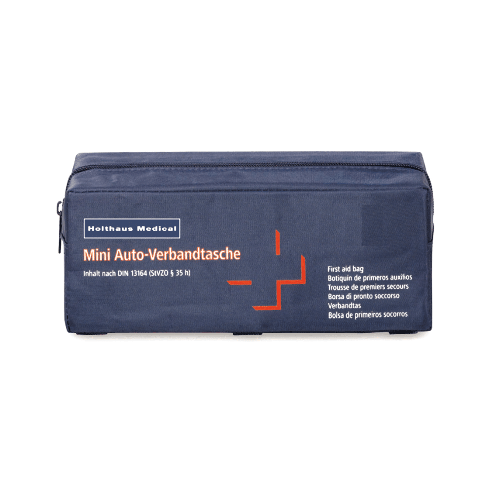 Holthaus Medical Mini-førstehjælpstaske til bilen, fremstillet af Holthaus Medical GmbH & Co. KG, er en blå førstehjælpstaske, der opfylder DIN-normerne 13164. Den er rektangulær og udstyret med en lynlås og har mærkninger på tysk, engelsk, fransk og spansk. Den synlige mærkning omfatter "Mini Auto-førstehjælpstaske" og "Førstehjælpstaske" og er derfor ideel til alle bilnødsituationer.