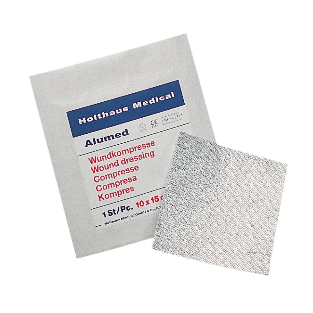 Holthaus Medical Alumed® sårkomprespakken fra Holthaus Medical GmbH & Co. KG viser en sårforbinding med aluminiumnet på flere sprog. Den måler 10 x 10 cm og indeholder et enkelt sterilt stykke (1 stk.).