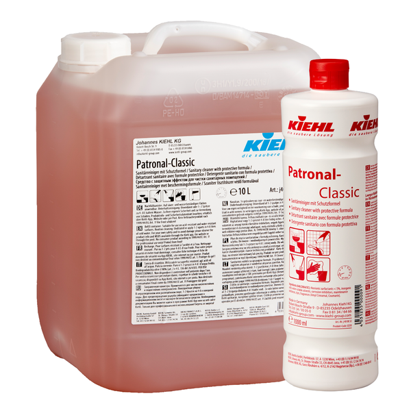 Zwei Gebinde des Kiehl Patronal-Classic Sanitärreinigers mit Schutzformel der Johannes Kiehl KG - ein 10L-Kanister und eine 1L-Flasche, beide mit weißem Etikett und roter Schrift; mit biologisch abbaubarer Rezeptur.