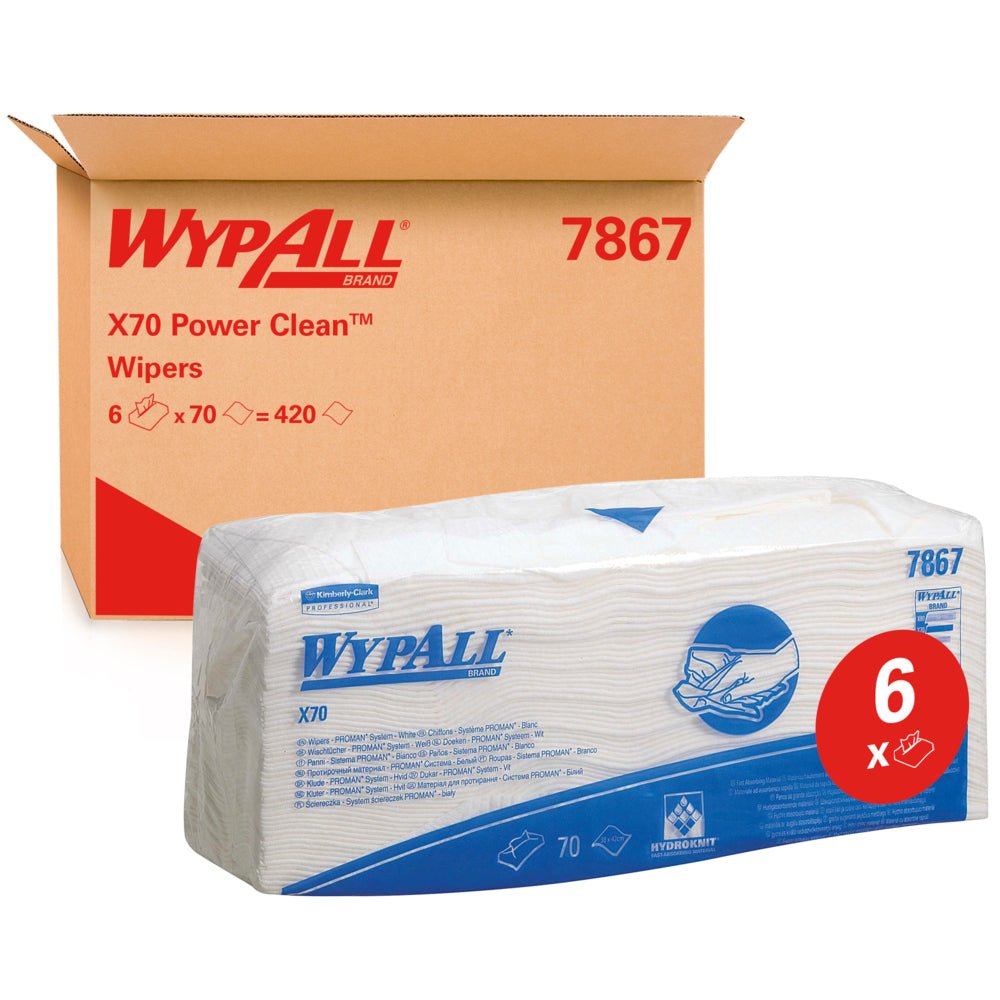 En pakke WypAll® X70 viskestykker - foldet / Hvid (6 poser x 70 klude) fra Kimberly-Clark GmbH er afbildet foran en kasse med teksten "WypAll 7867". Det røde "6x"-etiket fremhæver rengøringskludene i industrikvalitet med blå branding.