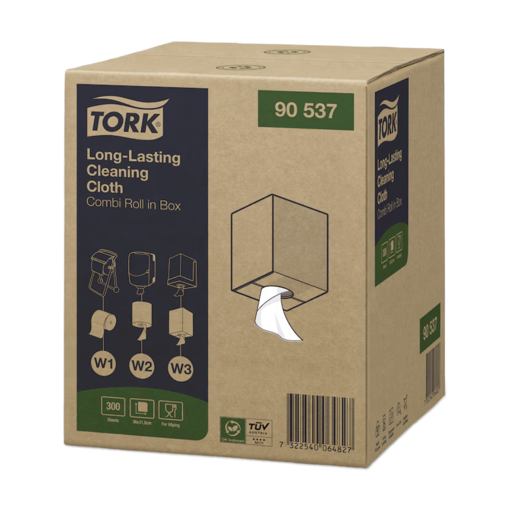 En karton med Tork 90537 Langtidsholdbare Rengøringsklude Premium W1 W2 W3 fra TORK – Essity Professional Hygiene Germany GmbH, med produktdetaljer og brugsanvisning. Dispenseråbningen giver udsyn til en hvid, fnugfri rengøringsklud, hvorpå modelnummeret 90537 tydeligt kan ses på toppen og siden.
