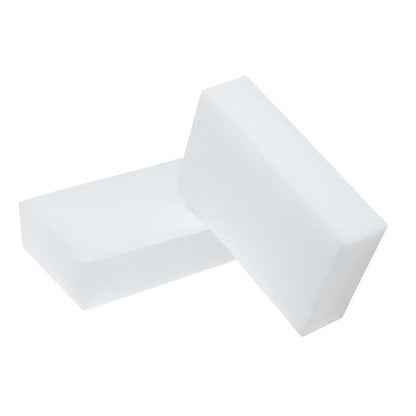 To Scotch-Brite® Magic Pads fra 3M Deutschland GmbH er afbildet på en enkel hvid baggrund - den ene ligger fladt, den anden er skråt oprejst og ligger delvist på den første pad.